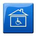 Haus in dem sich eine Person im Rollstuhl befindet